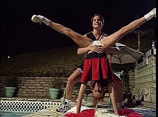 Lesbian cheerleaders munch pussy by the pool